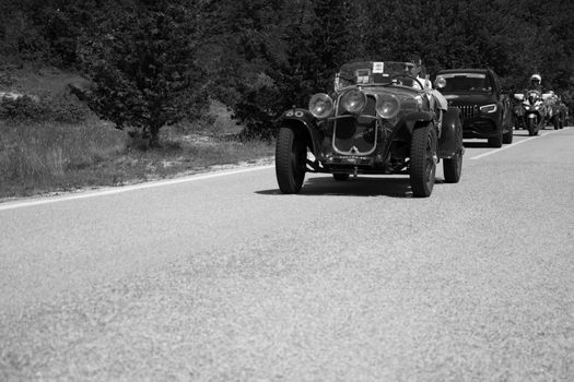 URBINO - ITALY - JUN 16 - 2022 : FIAT 514 MM 1930 on an old racing car in rally Mille Miglia 2022 the famous italian historical race (1927-1957