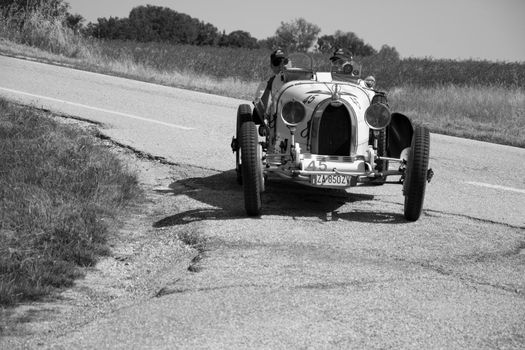 URBINO - ITALY - JUN 16 - 2022 : LANCIA LAMBA V SERIE CASARO 1925 on an old racing car in rally Mille Miglia 2022 the famous italian historical race (1927-1957