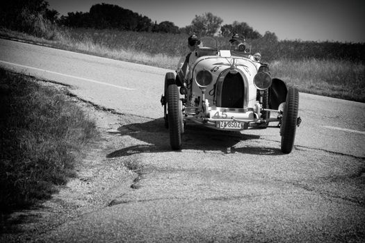 URBINO - ITALY - JUN 16 - 2022 : LANCIA LAMBA V SERIE CASARO 1925 on an old racing car in rally Mille Miglia 2022 the famous italian historical race (1927-1957