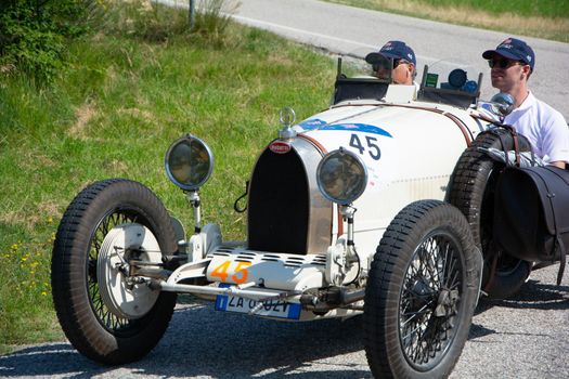 URBINO - ITALY - JUN 16 - 2022 : LANCIA LAMBA V SERIE CASARO 1925 on an old racing car in rally Mille Miglia 2022 the famous italian historical race (1927-1957