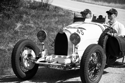 URBINO - ITALY - JUN 16 - 2022 : LANCIA LAMBA V SERIE CASARO 1925 on an old racing car in rally Mille Miglia 2022 the famous italian historical race (1927-1957