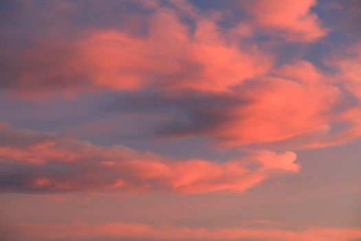 Pink and orange Clouds and lovely sky at Sunset in Alicante in summer