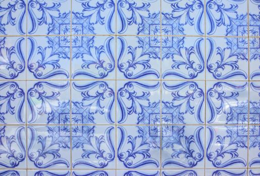 Typical old tiles of Portugal, detail of a classic ceramic tiles azulejo, art of Portugal