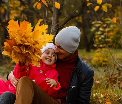 Colorful autumn leaves, happy family