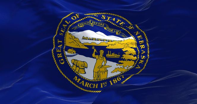 Close-up view of the Nebraska state flag waving. Nebraska is a state in the Midwestern region of the United States. Fabric textured background