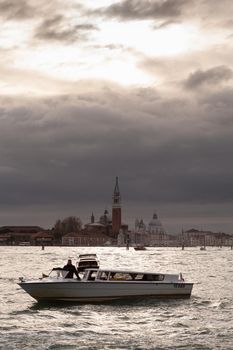 View of the St. Giorgio church on the cloudy sky in Venice