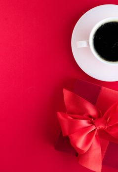 Romantic celebration, lifestyle and birthday present concept - Luxury beauty gift box and coffee on red, flatlay