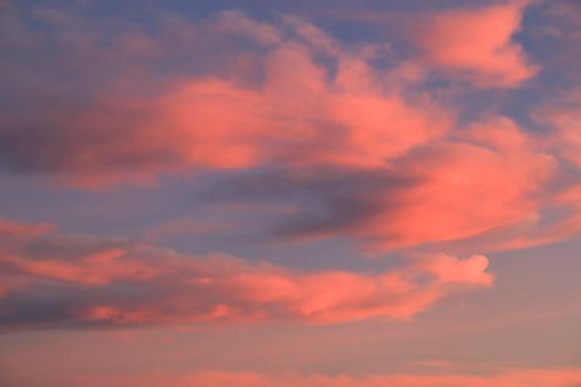 Pink and orange Clouds and lovely sky at Sunset in Alicante in summer