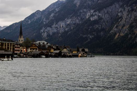 Hallstatt tourist town view from the lake in Austria
