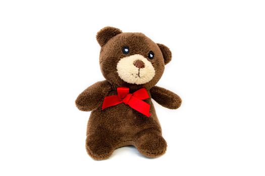 Lovely brown bear doll isolated on white background. Adorable teddy bear for decorative. High quality photo