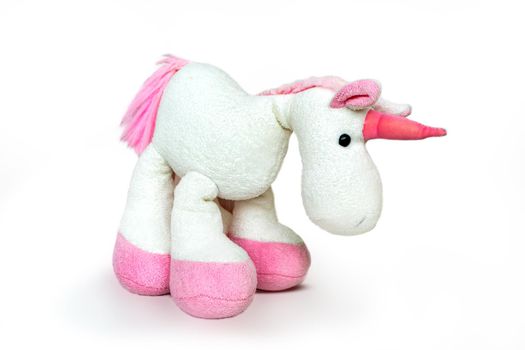 Lovely brown white pony isolated on white background. Adorable teddy bear for decorative. High quality photo