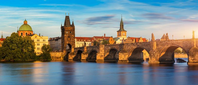 Charles Bridge sunset view of the Old Town pier architecture, Charles Bridge over Vltava river in Prague, Czechia. Old Town of Prague with Charles Bridge, Prague, Czech Republic.