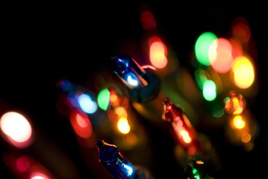 a narrow depth of field image of colourful christmas lights