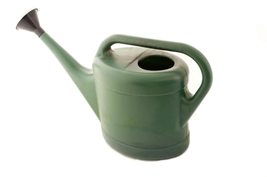 Close-up of a green plastic round watering can with handle and spout, useful for gardening, isolated on white