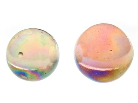 Close Up Still Life of Two Colorful Glass Marbles of Different Sizes Isolated on White Studio Background with Copy Space