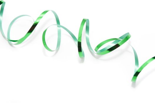 a generic green ribbon background on white could be used for st patricks day or christmas 