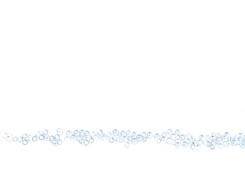 A plain white background with a row of water droplet beads along the bottom edge