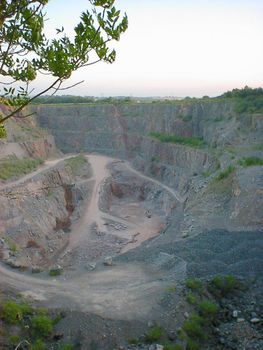 High angle view of pathways and ridges of mined quarry in daylight