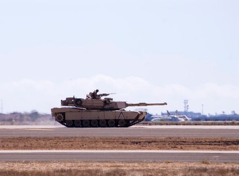 a side view of an M1 abram battle tank