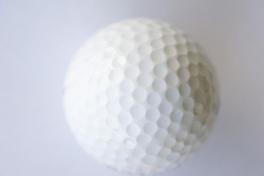 a golf ball on a white background