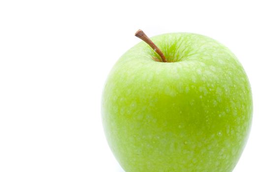 Close-up of a fresh Granny Smith green apple, on white background