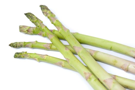 Fresh green asparagus spears or shoots isolated on white, a delicacy ingredient for gourmet cuisine