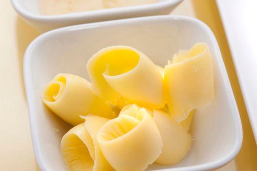 Closeup of coiled butter rolls in a dish to be served as an accompaniment to a meal or bread rolls