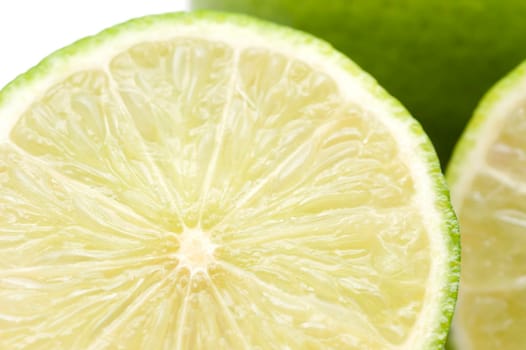 Close-up of fresh and green lemon lime halves