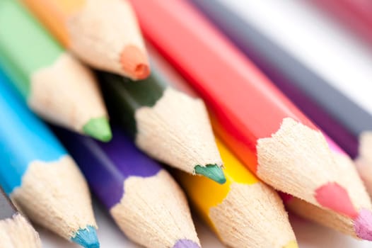 Pile of colored pencils, sharpened for drawing.
