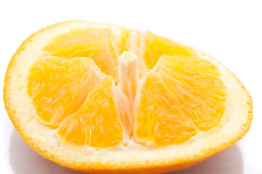 Sliced orange showing the structure of the fleshy pulp and segments on the rind