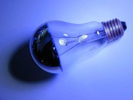 blue tinted image of an ES screw in GLS half mirror reflector lamp