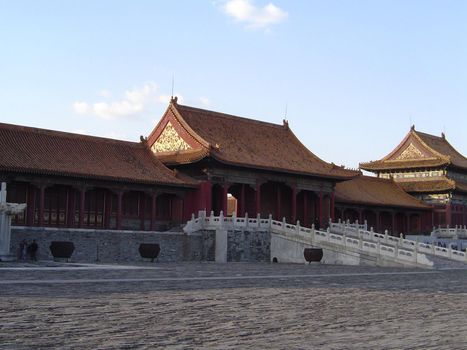 Architectural Exterior of Deserted Temple in Forbidden City at Late Afternoon with Long Shadows and Blue Sky