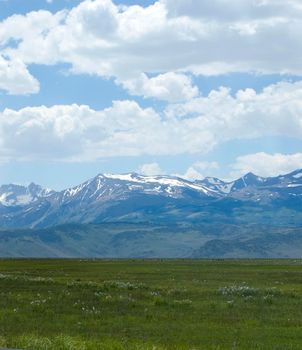 mountains in the sierra navada capped with spring melting snow