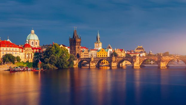 Charles Bridge sunset view of the Old Town pier architecture, Charles Bridge over Vltava river in Prague, Czechia. Old Town of Prague with Charles Bridge, Prague, Czech Republic.
