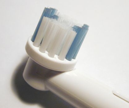close up image on the head of an electric tooth brush