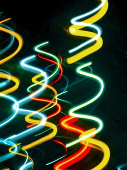 bright glowing corkscrew pattern, spiral light trails in vivid colours