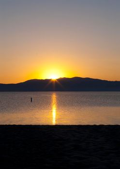 sunset reflections over lake tahoe