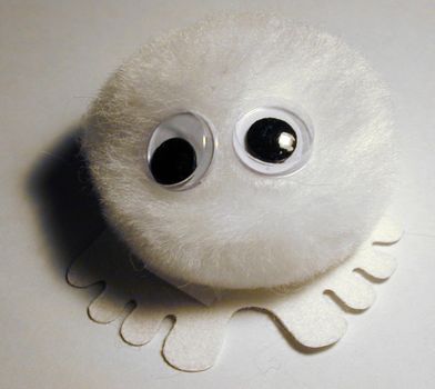 A furry mascot stick on google eyed furball