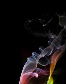 colorful illuminated particles of smoke vapor