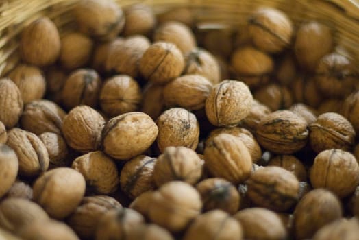 a bowl of wallnuts pictured with a narrow depth of field