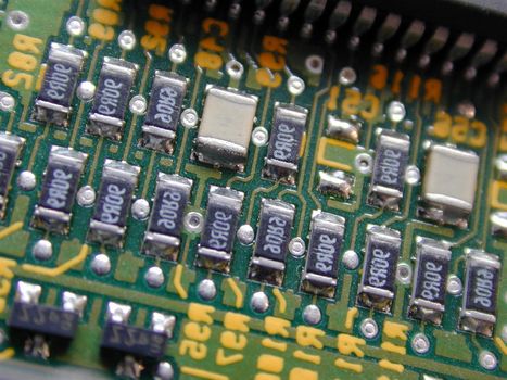 Printed circuit board PCB in detail close-up with numbered resistors