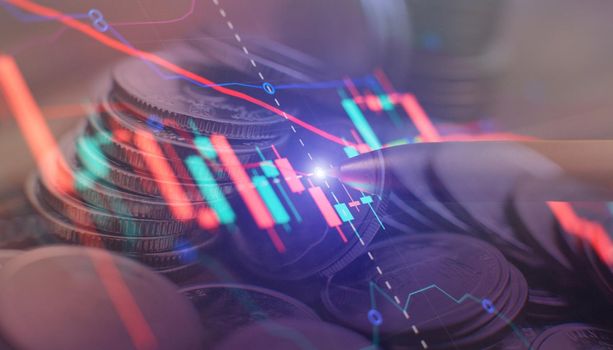 Double exposure of city night and stack of coins for finance investor, Forex trading candlestick chart, Cryptocurrency Digital economy. background for invest