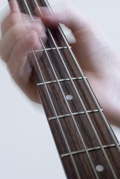 someone playing the bass guitar