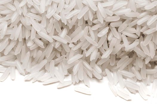 Long-grain white rice, a cereal grain high in calories and a worldwide staple in nutrition and diet which is often parboiled before being sold to consumers