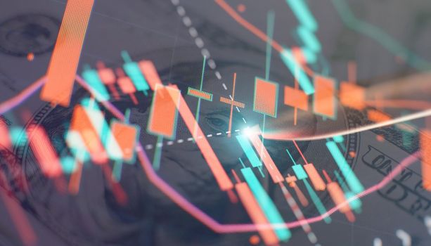 Charts of financial instruments with various type of indicators including volume analysis for professional technical analysis on the monitor of a computer.