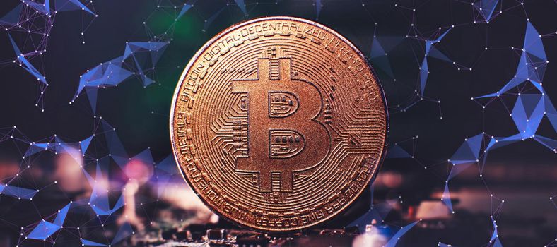 Bitcoin cryptocurrency new version on computer electronic circuit board background . Virtual cryptocurrency money Bitcoin golden