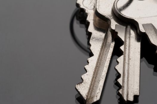 macro image of three keys on a keyring