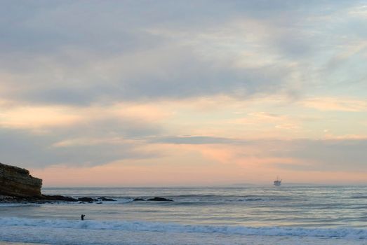sunset from refugio, orange sky and offshore oil platforms