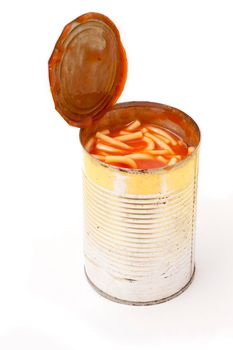Opened unlabelled tin of canned spaghetti in tomato sauce on a white background, high angle view