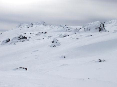 alpine scene with a thick covering of clean white snow